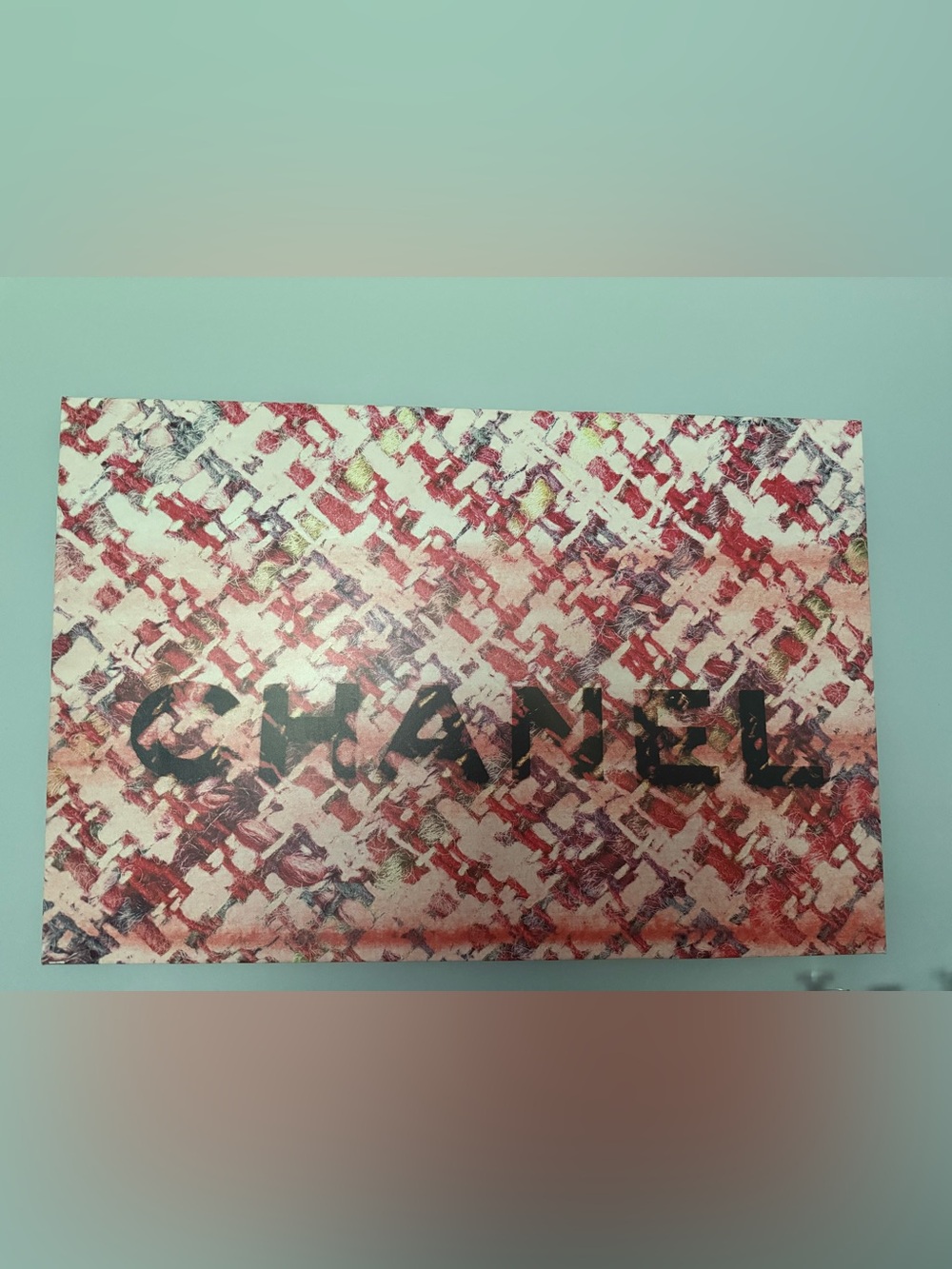 CHANEL Red and Cream Tweed-Print Box with Black Logo canvas wall art